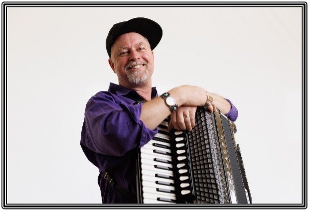 Ernest James with his accordion
