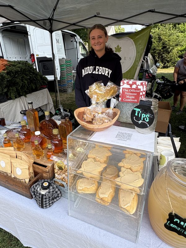 Maple syrup and cookies vendor at her stand
